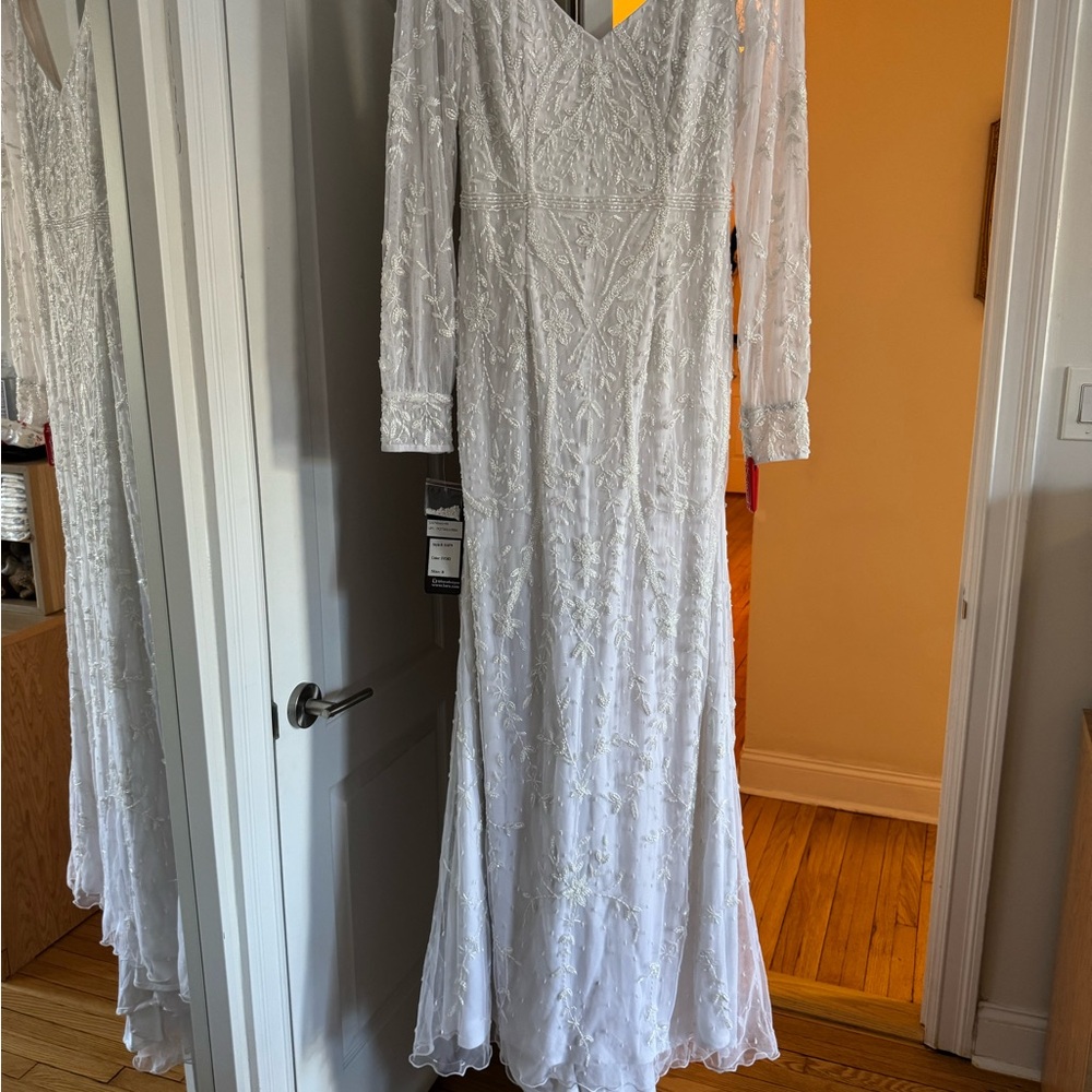 Elegant White Long Sleeve Gown